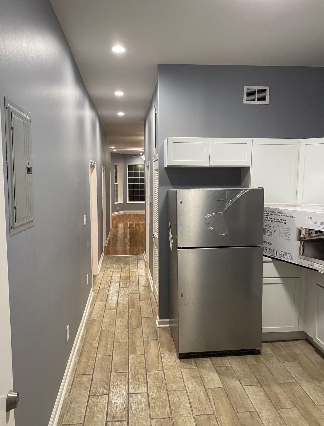 Finished hallway into kitchen