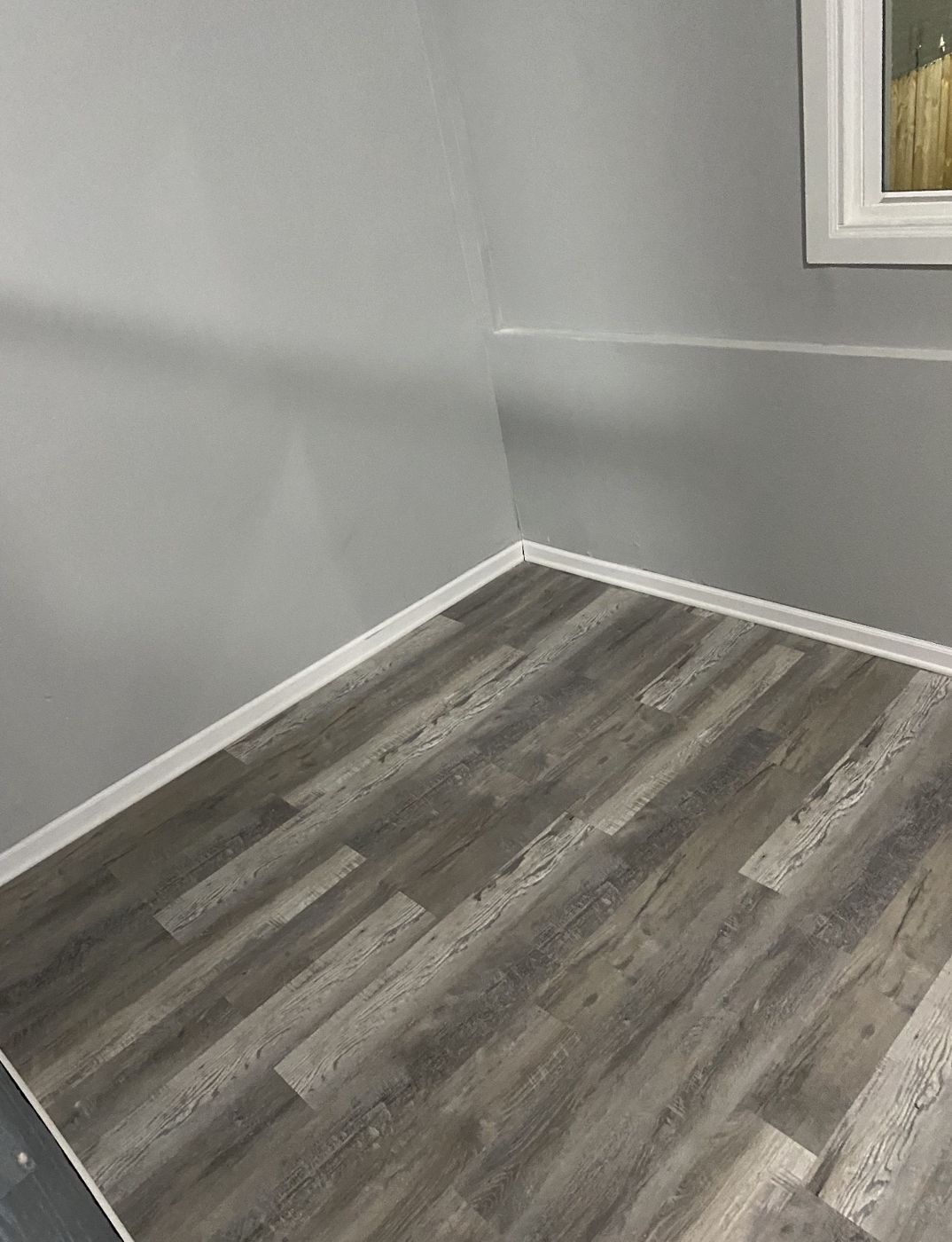 New LVP floor and base trim